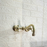 Unlacquered Brass Curved Wall Mounted faucet